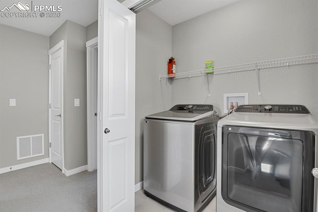 The included washing machine and clothes dryer