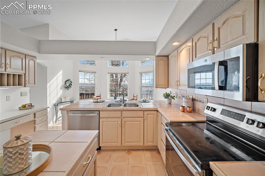 Large kitchen with views!