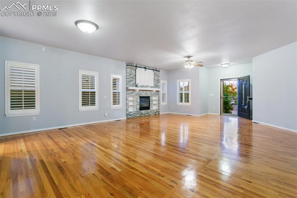 Beautiful wood floors and custom fireplace
