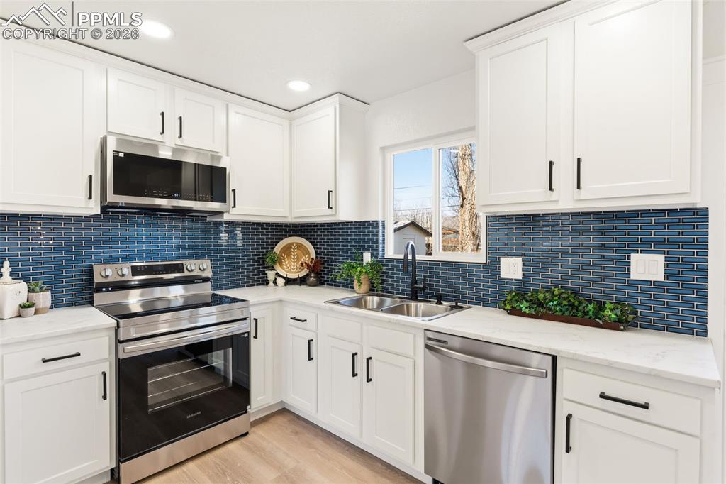 Updated kitchen with modern finishes, perfect for cooking and hosting