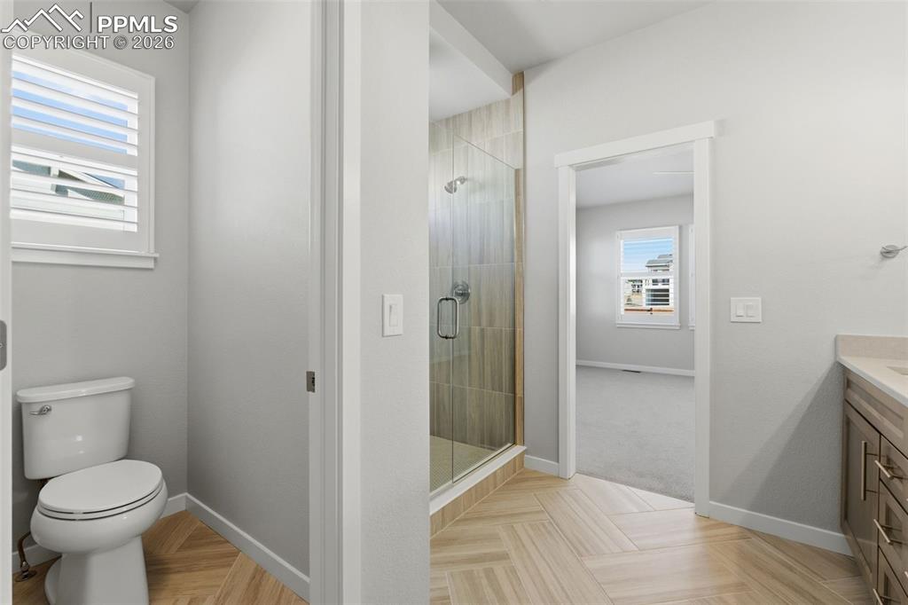 Secondary full bathroom with tub/shower combo, tile surround, and contemporary fixtures