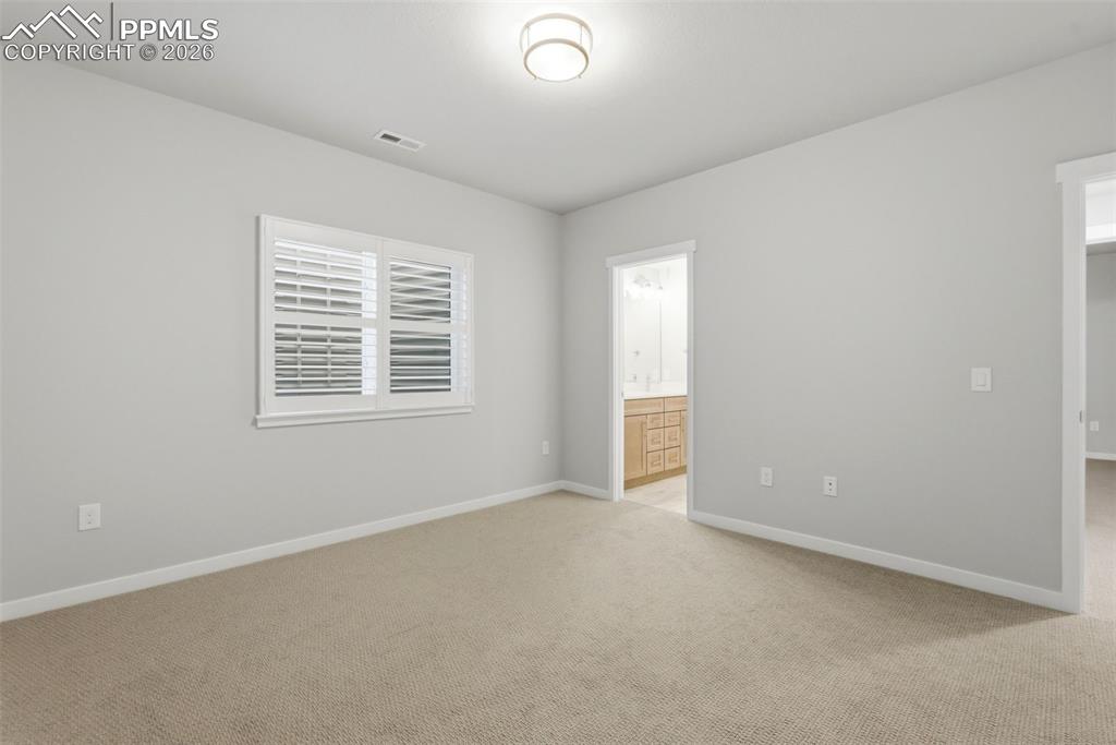 Additional basement bedroom with carpet flooring, recessed lighting, and large closet
