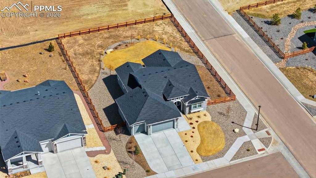 Aerial view highlighting property location, large lot, and picturesque Colorado landscape setting