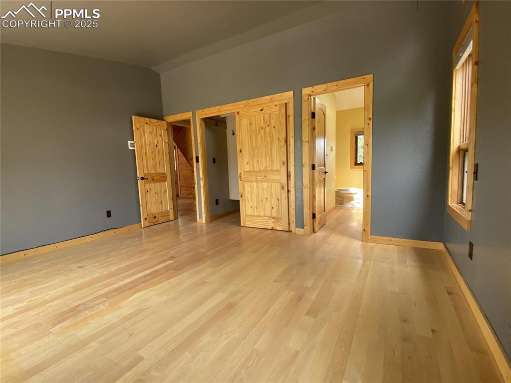 With a walk in closet and connected bathroom