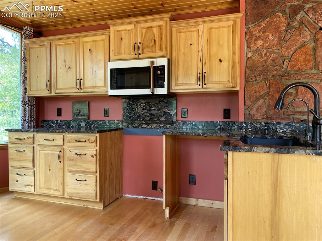 And maple hard wood floors, granite countertops and hickory cabinets