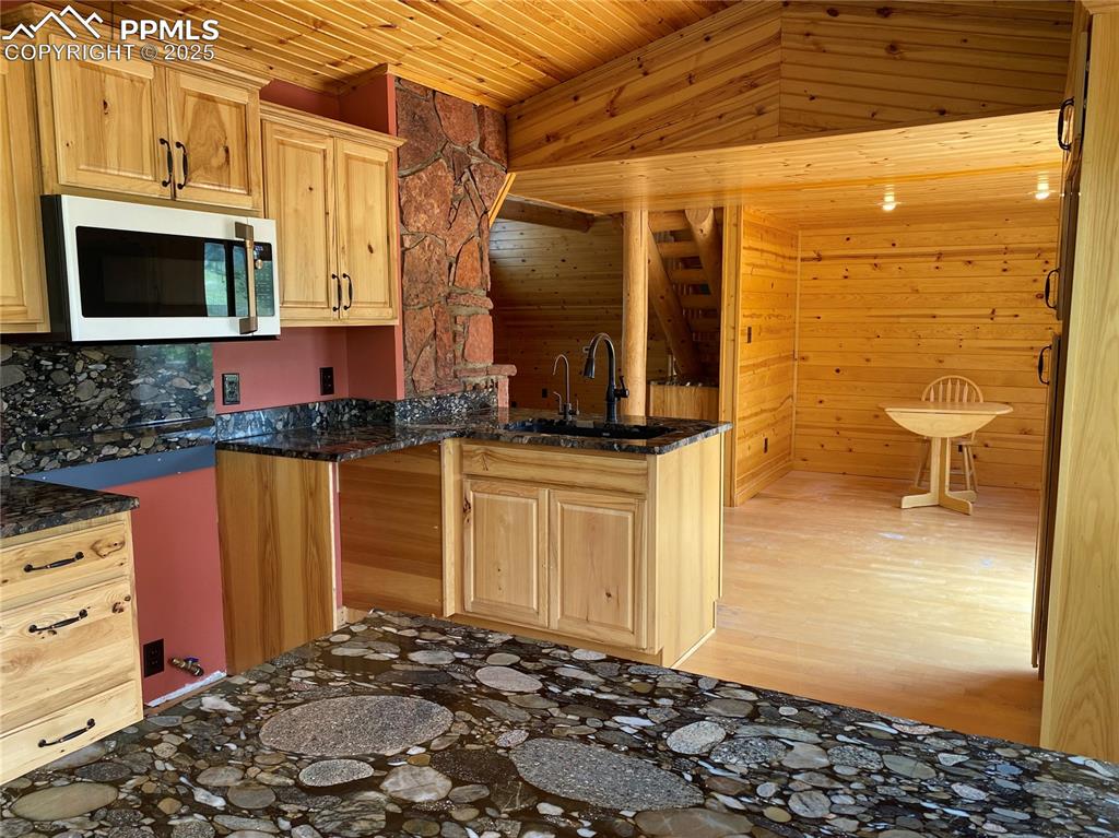 Another look at the granite countertops and hickory cabinets