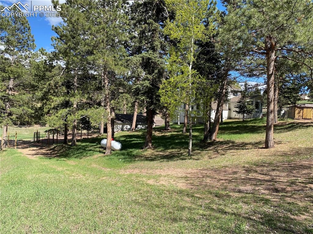 Offering seclusion while being minutes away from downtown Woodland Park