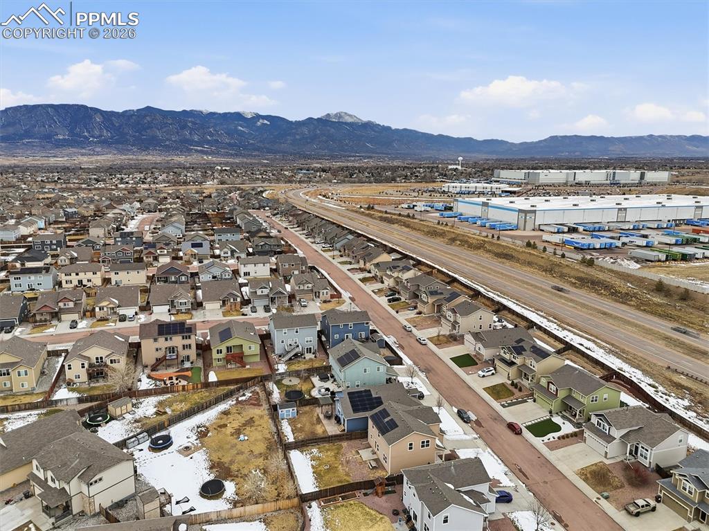 Aerial perspective of suburban area featuring mountains