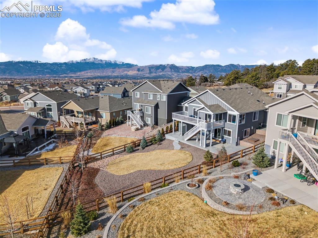 Aerial view of residential area with a mountainous background