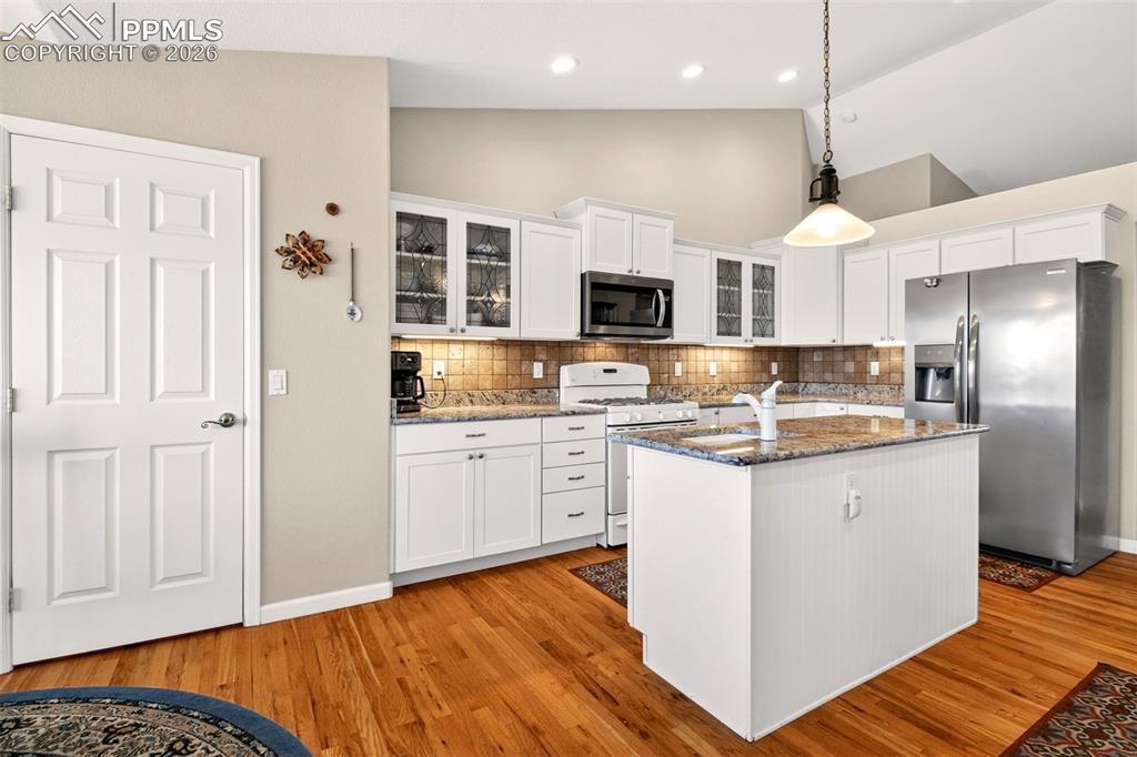 Large Pantry, Gas Stove, Tile Backsplash.