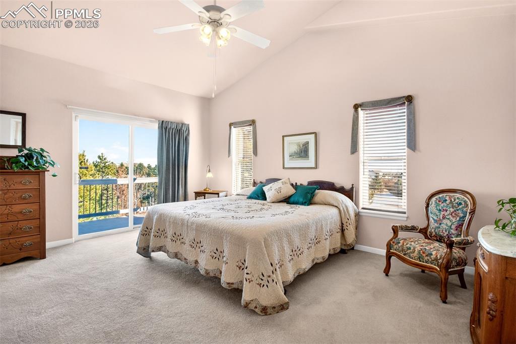 Master Bedroom With Vaulted Ceiling, Private Deck Overlooking The Back Yard.