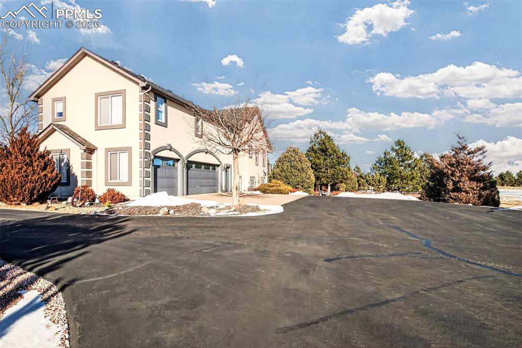 Newer Roof, Stucco Siding, Water Softening System, Beautiful Landscaping.