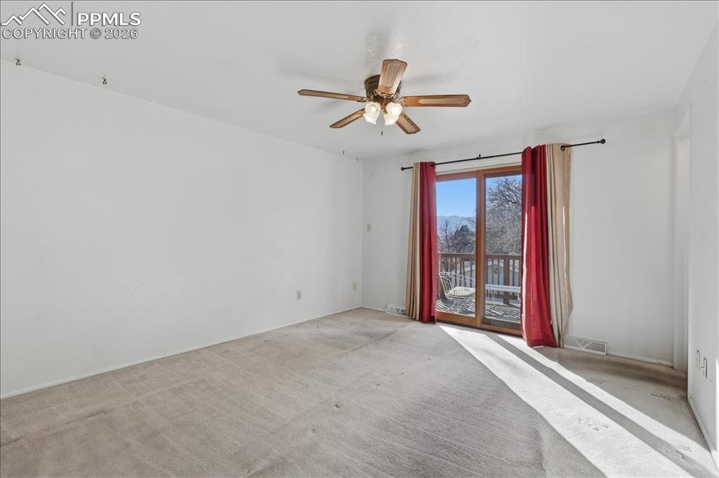 Primary bedroom walks out to upper patio