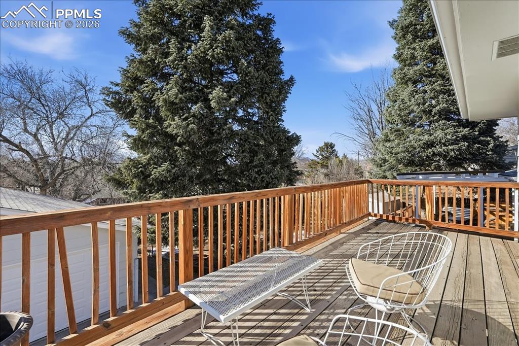 Walk out upper patio from primary bedroom