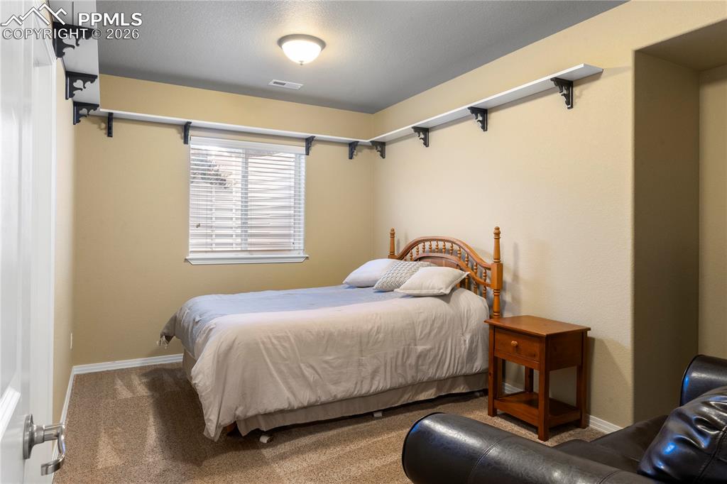 Basement bedroom with walk in closet. 