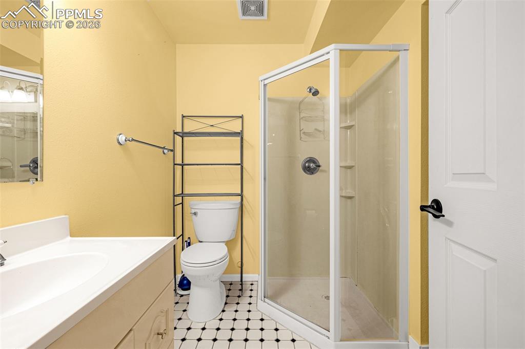 Basement level 3/4 bath (laundry hook up next to shower)