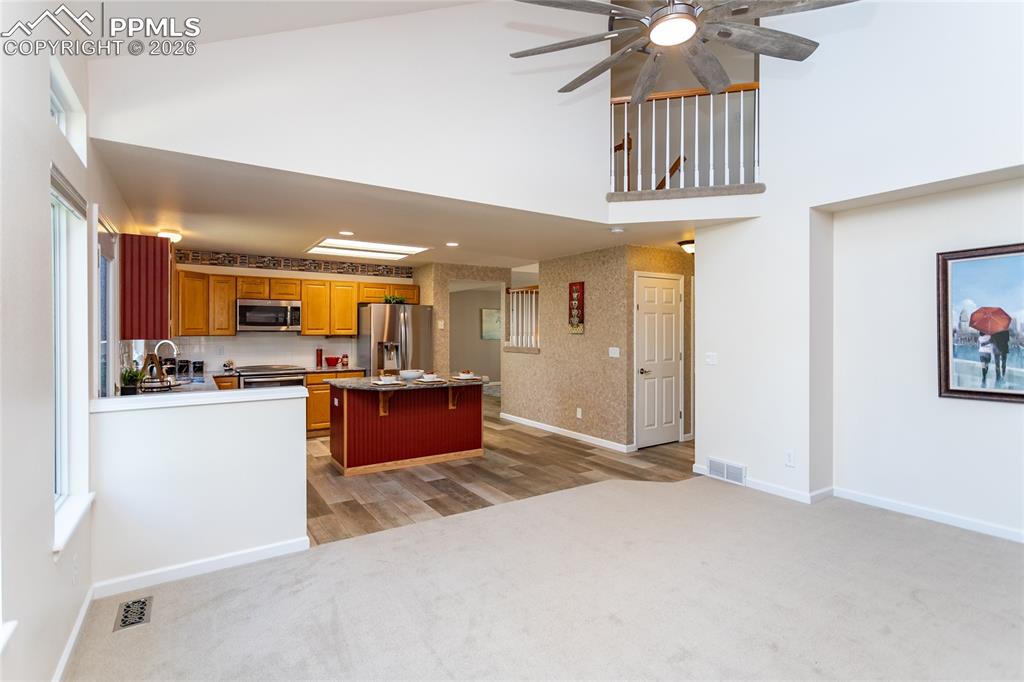 Towards the kitchen.