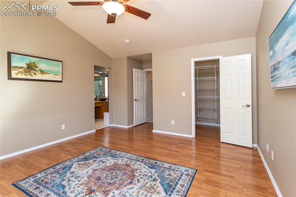 Main bedroom shooting towards the closet, entry, and bathroom entry