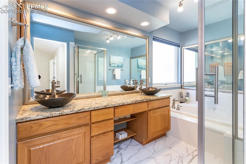 Main bath-5 piece with double vanity, soaking tub, shower.