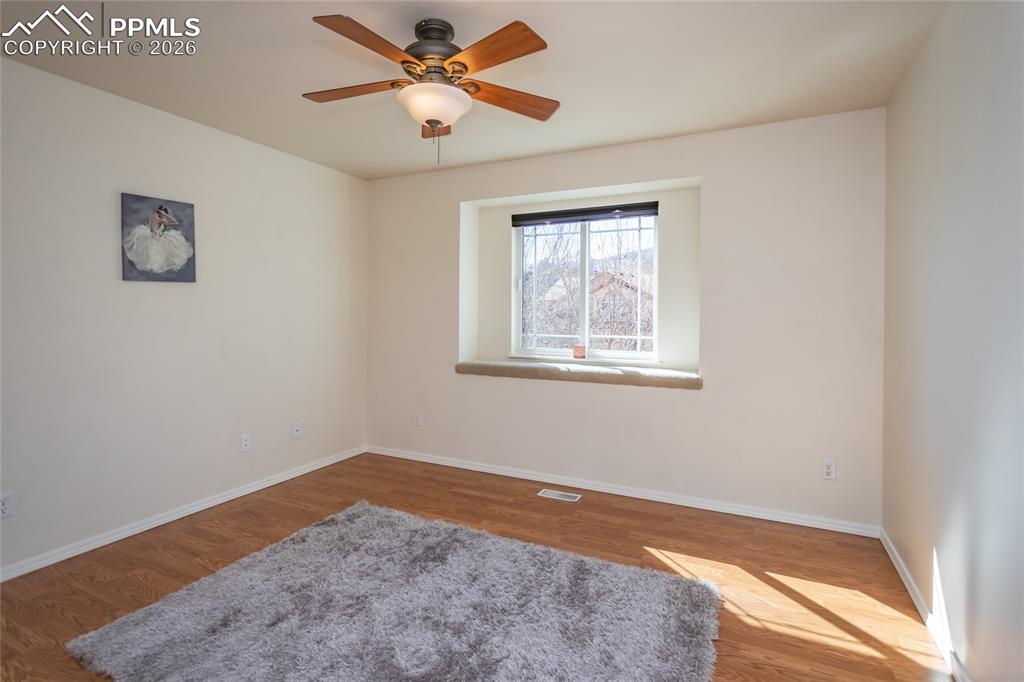 The 4th bedroom is east-facing and has Pikes Peak views.