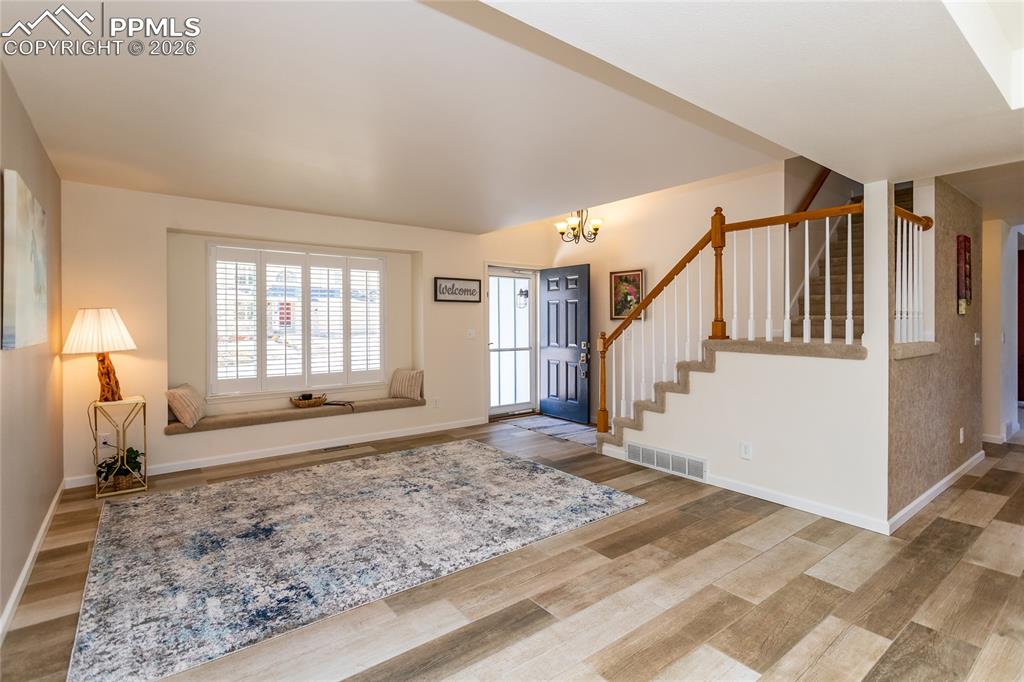 Beautiful commercial grade wood-look commercial grade procelain tile on main level.