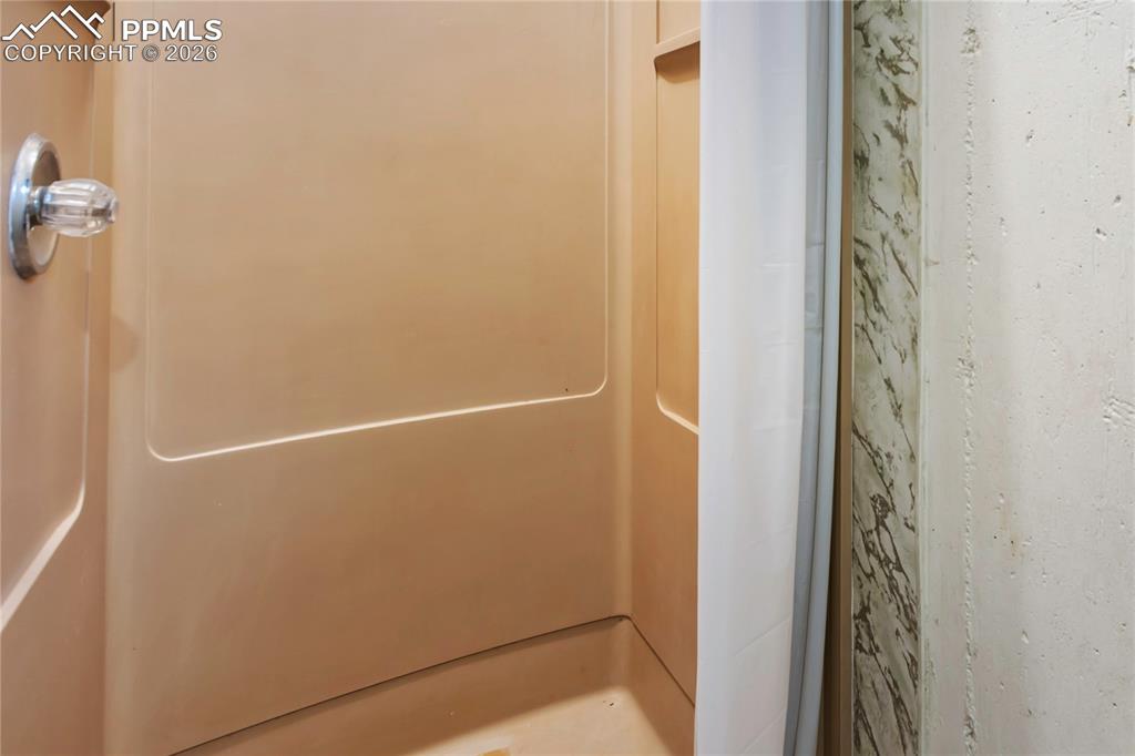 Basement laundry room includes this shower.  Convenient for guests as it is separate from the basement 1/2 bath 