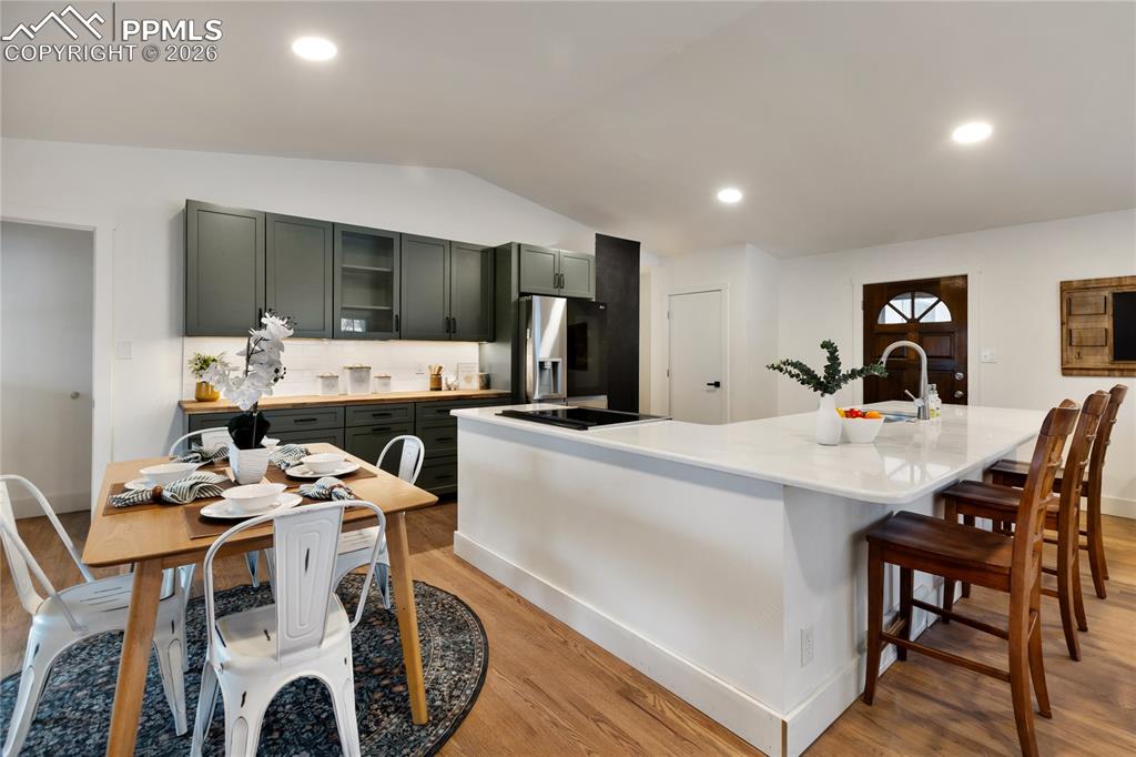 Brand new kitchen!  New appliances, quartz countertop on the island.  There is also a beautiful prep area with butcher block countertop and includes under cabinet lighting - perfect for food prep and entertaining.  