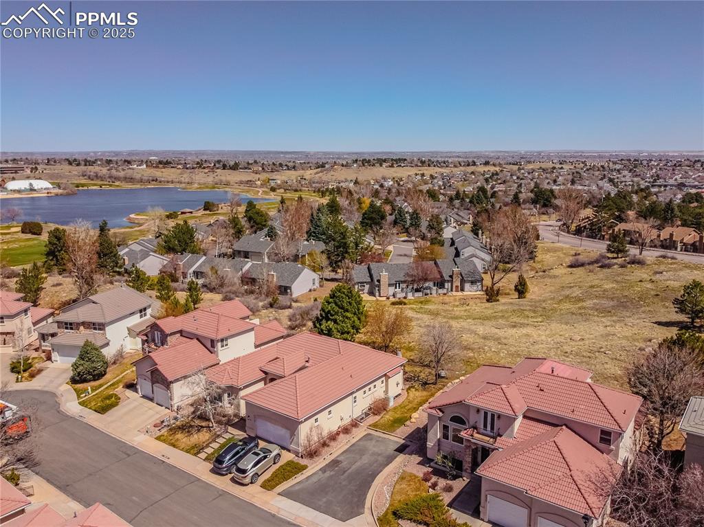 Bird's eye view featuring a water view and a residential view