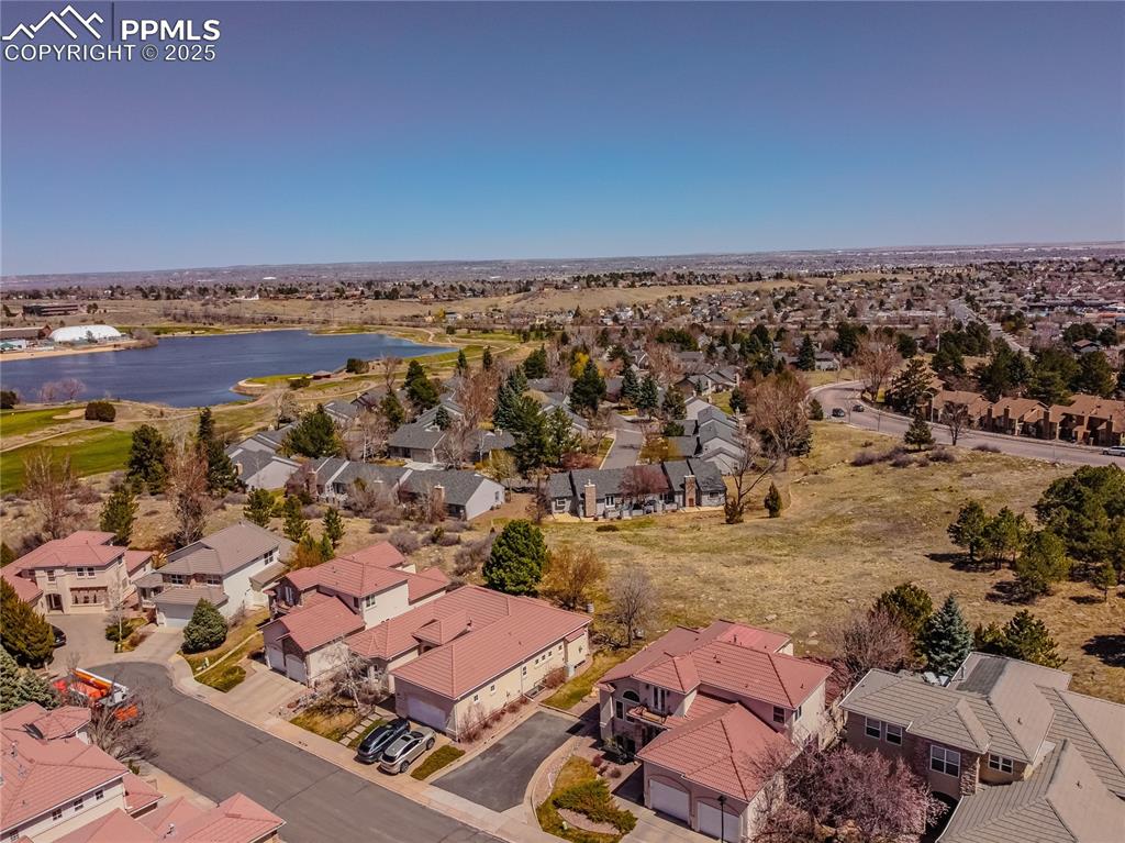 Bird's eye view featuring a water view and a residential view