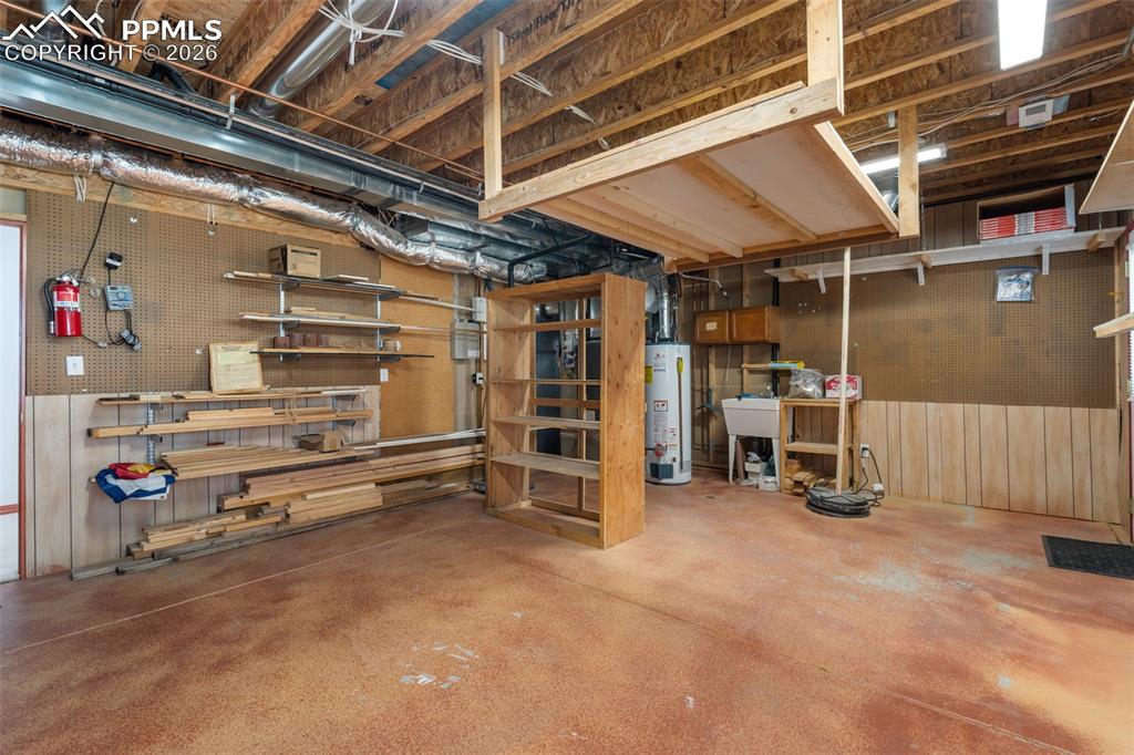 Large work/storage area, another exterior door to lower deck