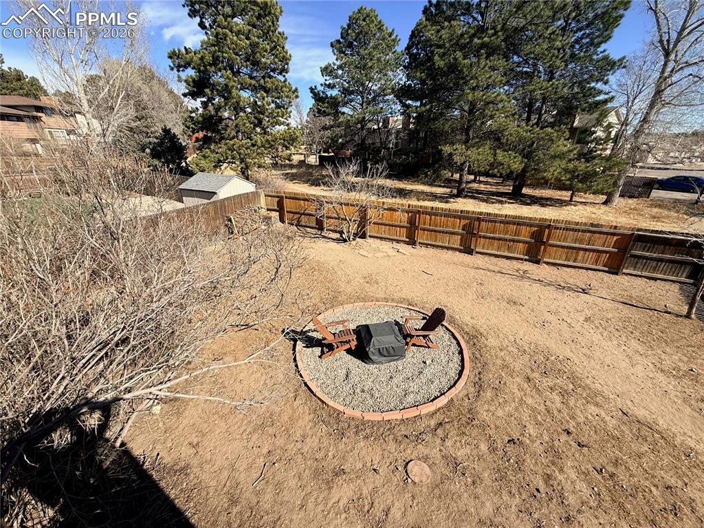 Fenced backyard featuring a patio area