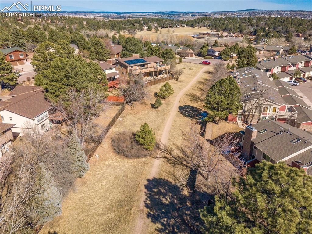 View of property location with nearby suburban area