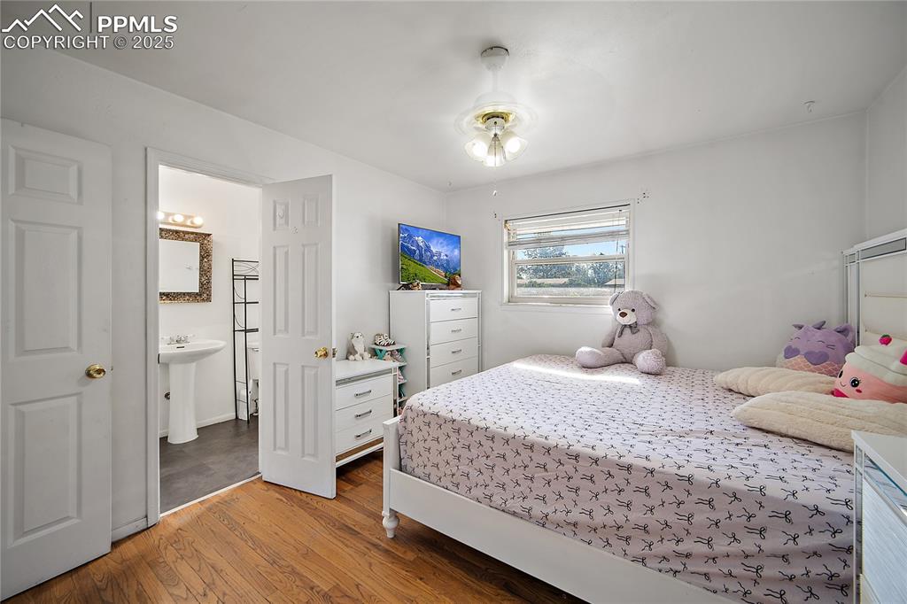 Bedroom with light wood-type flooring