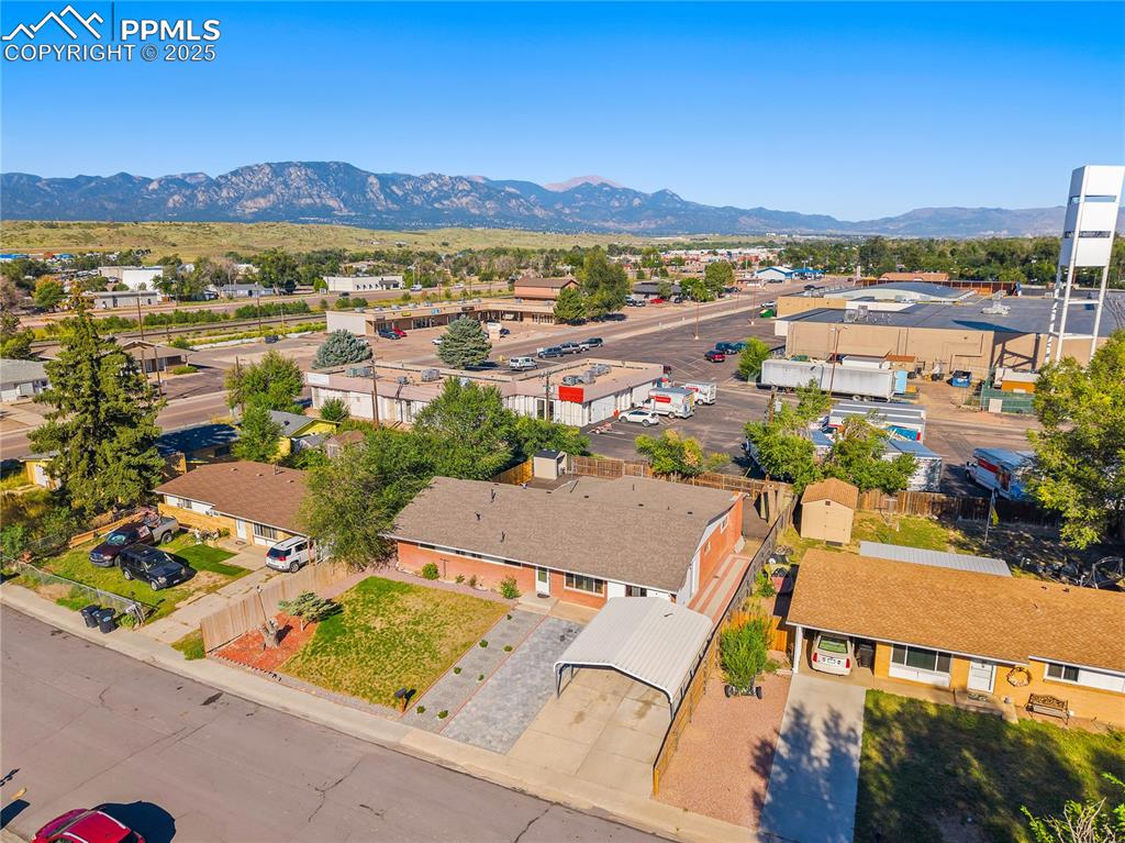 Aerial perspective of suburban area featuring mountains