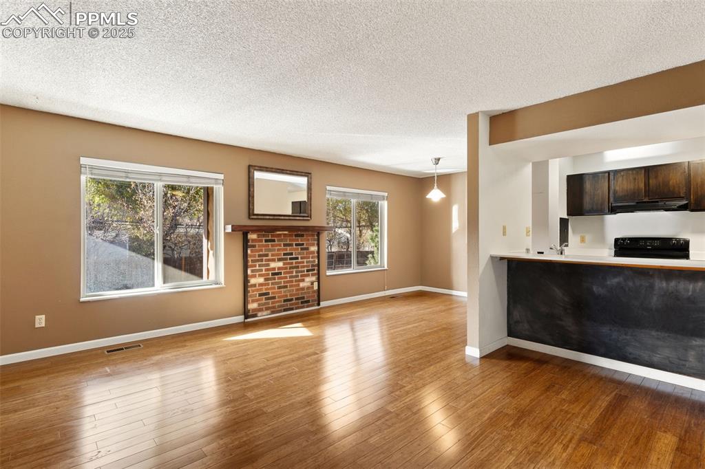 Unit 125 with hardwood floors and new vinyl windows