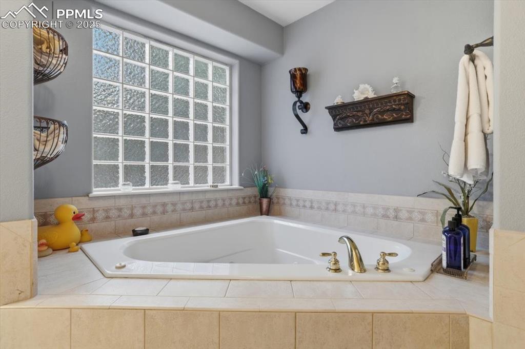 5-piece master bathroom, with large walk-in closet and jetted tub