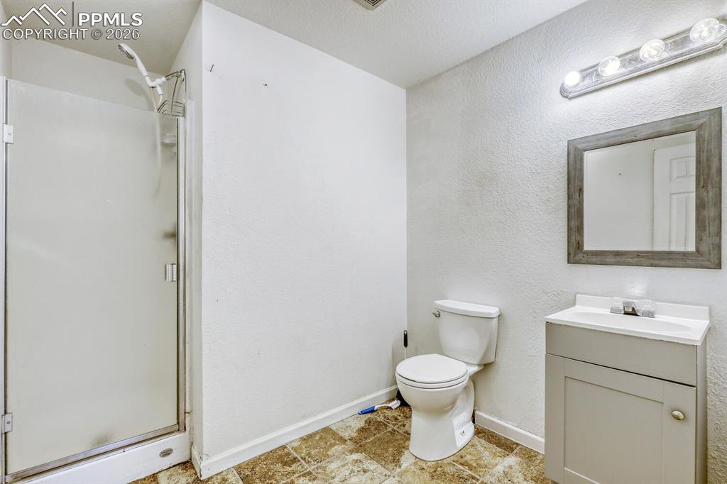 Lower Level-3/4 bathroom en-suite with fifth bedroom