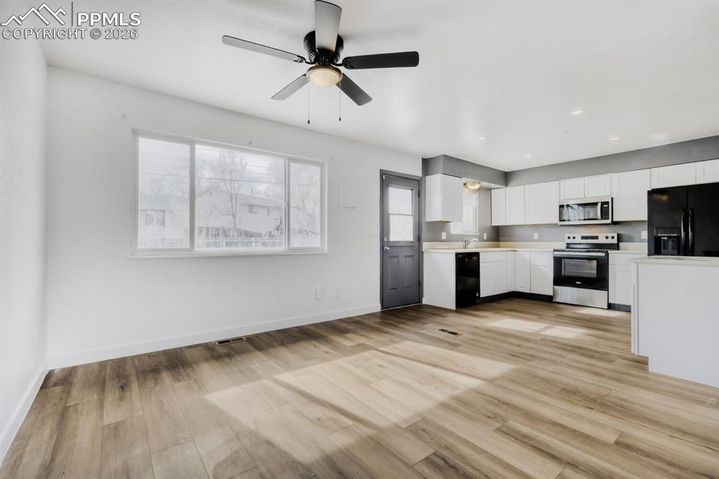 Upper Level-Dining area adjacent to kitchen and living room