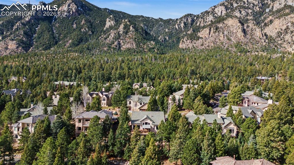 Your backyard oasis blends seamlessly with the majestic, rugged beauty of the surrounding mountain landscape
