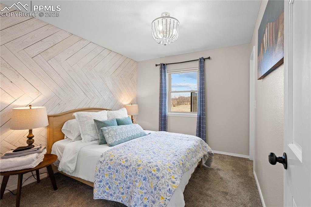 Main level bedroom #2 is located across from the bathroom.