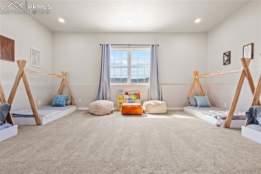 Another view of the bonus room showing the second window...currently is used as a playroom/fun space for sleepovers.