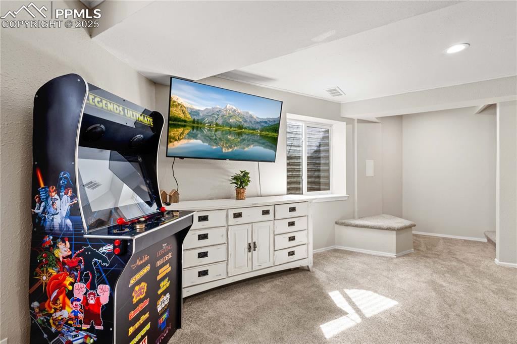 Another view of the family room ...stairs heading upstairs can be seen to the left. 