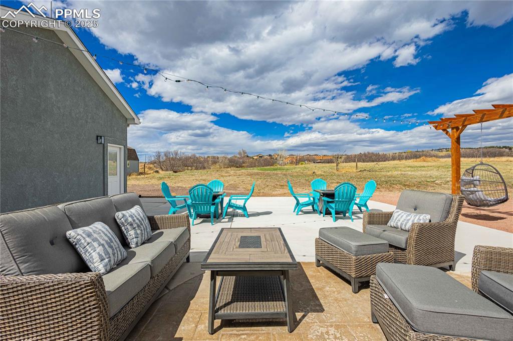 Fun back yard space...all patio furniture and fire pit could be included. 