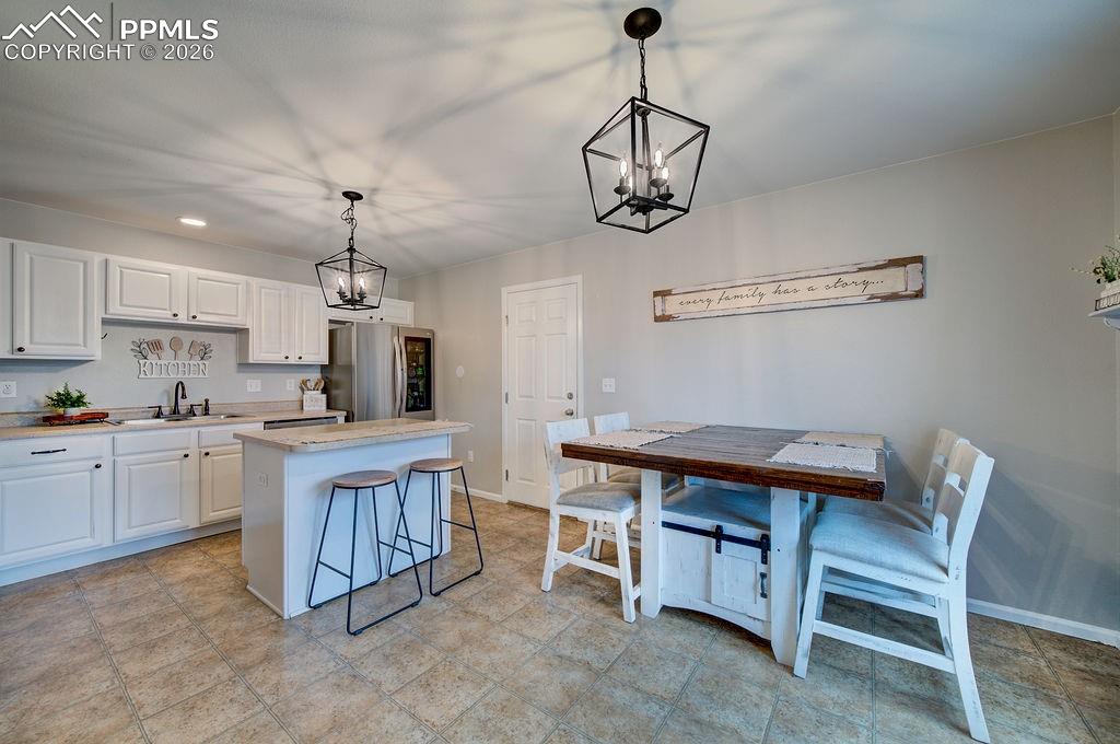 Dining Area and Kitchen.