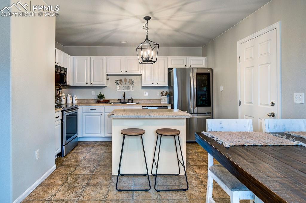 View of the Kitchen from the Dining Area.