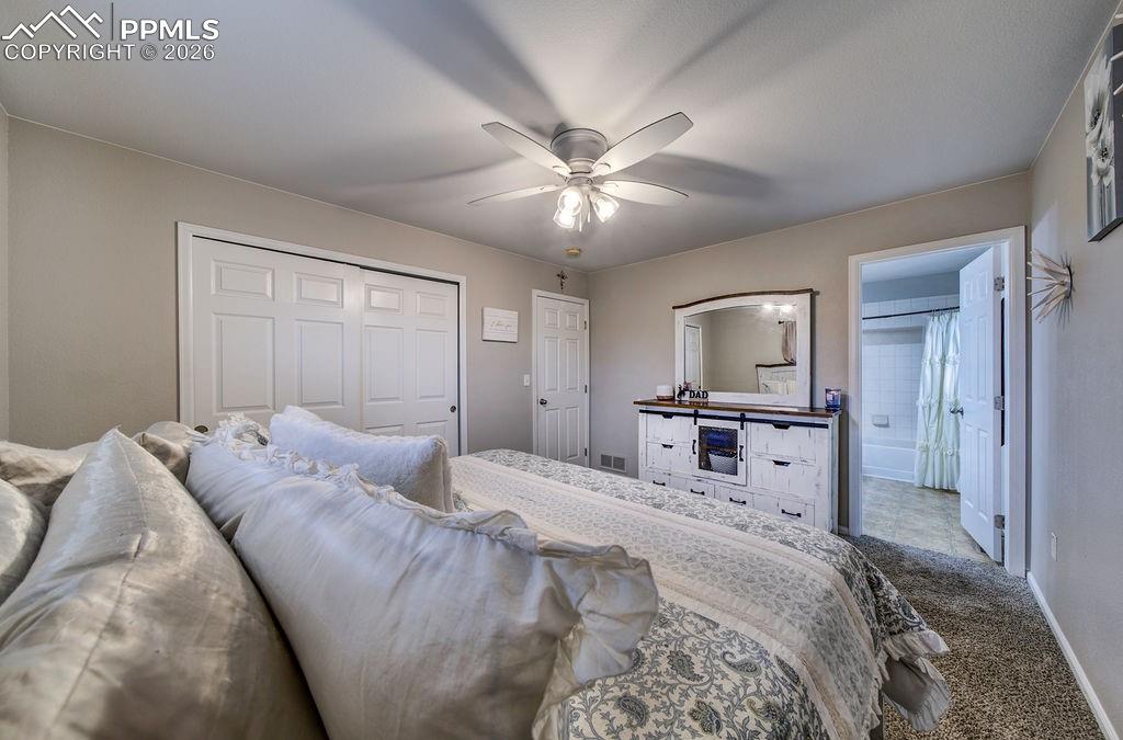 Primary Bedroom into the Full Primary Bathroom.