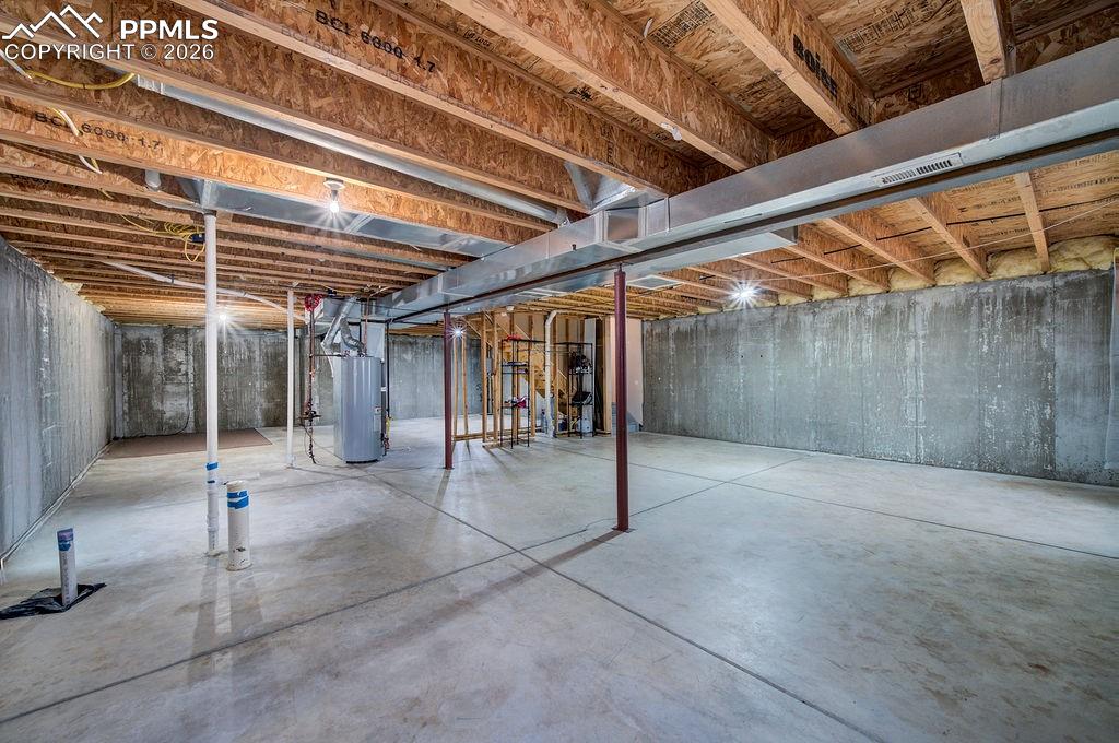 Unfinished basement with bath rough in.