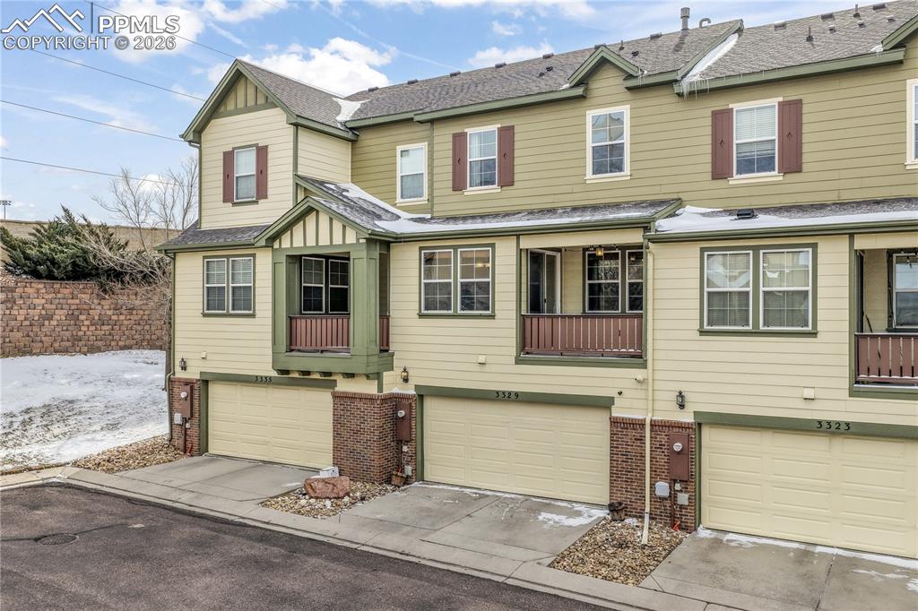 Back of home and 2 car garage