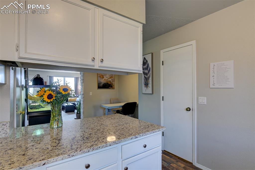 Breakfast bar and prep area. 1/2 bath shown to the right. 