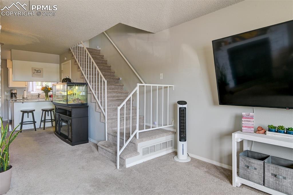 Stairway up to Bedrooms and Full bathroom 
